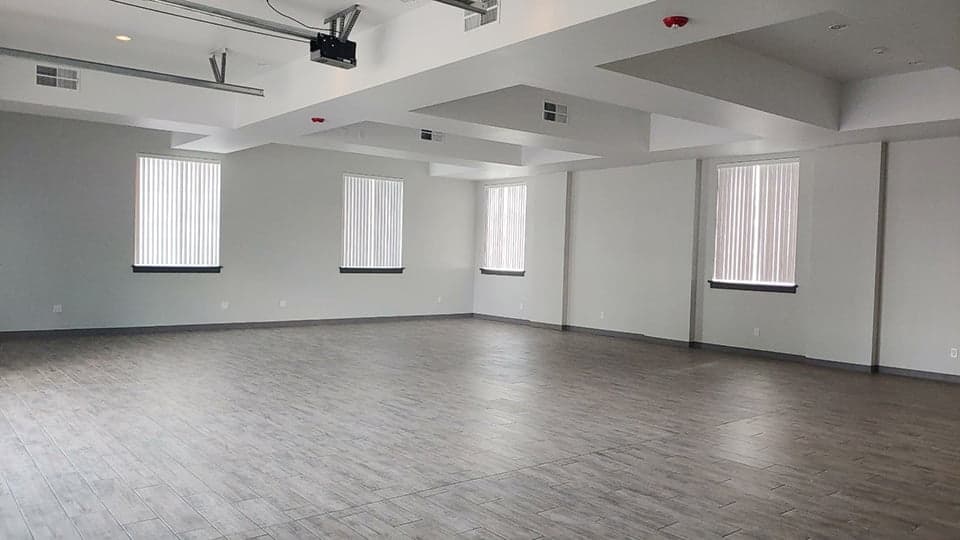 A church hall after RSI's fire restoration, with clean floors and freshly painted walls